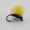 Yellow fluffy fishing fly tied to a small curved hook, an artificial lure for fly fishing.
