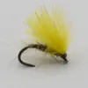 Fly fishing lure: curved hook with bright yellow marabou feathers (fuzzy streamer).