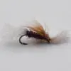 Close-up of a brown and tan fishing fly with fluffy hackle on a curved hook (fly fishing lure)