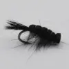 Close-up of a black fuzzy fishing fly tied to a curved hook with long hair fibers protruding from the body.