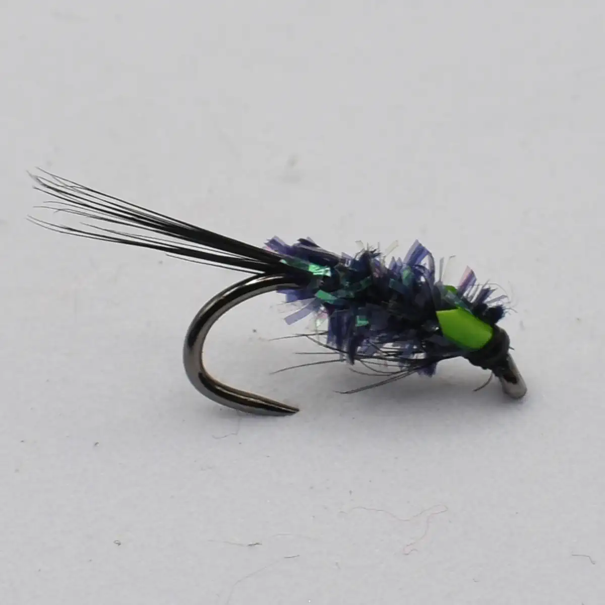 Blue-purple marabou streamer fishing fly with a bright green bead head on a curved hook, used as bait for rod-and-line fishing.