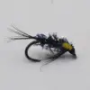 Close-up of a metallic blue and purple tinsel fishing fly tied to a hook with long black tail fibers.