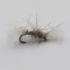 Close-up of a bead-headed fishing fly with iridescent beads and wispy tan hackle on a curved hook.