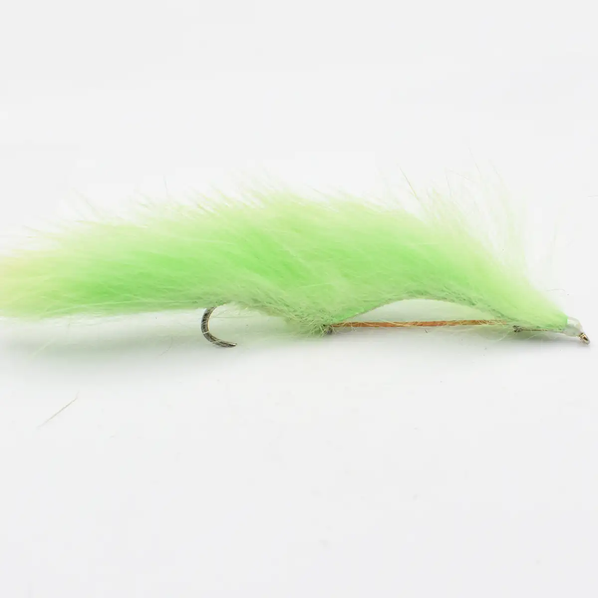 Bright lime-green fluffy fishing fly tied to a small hook used for fly fishing