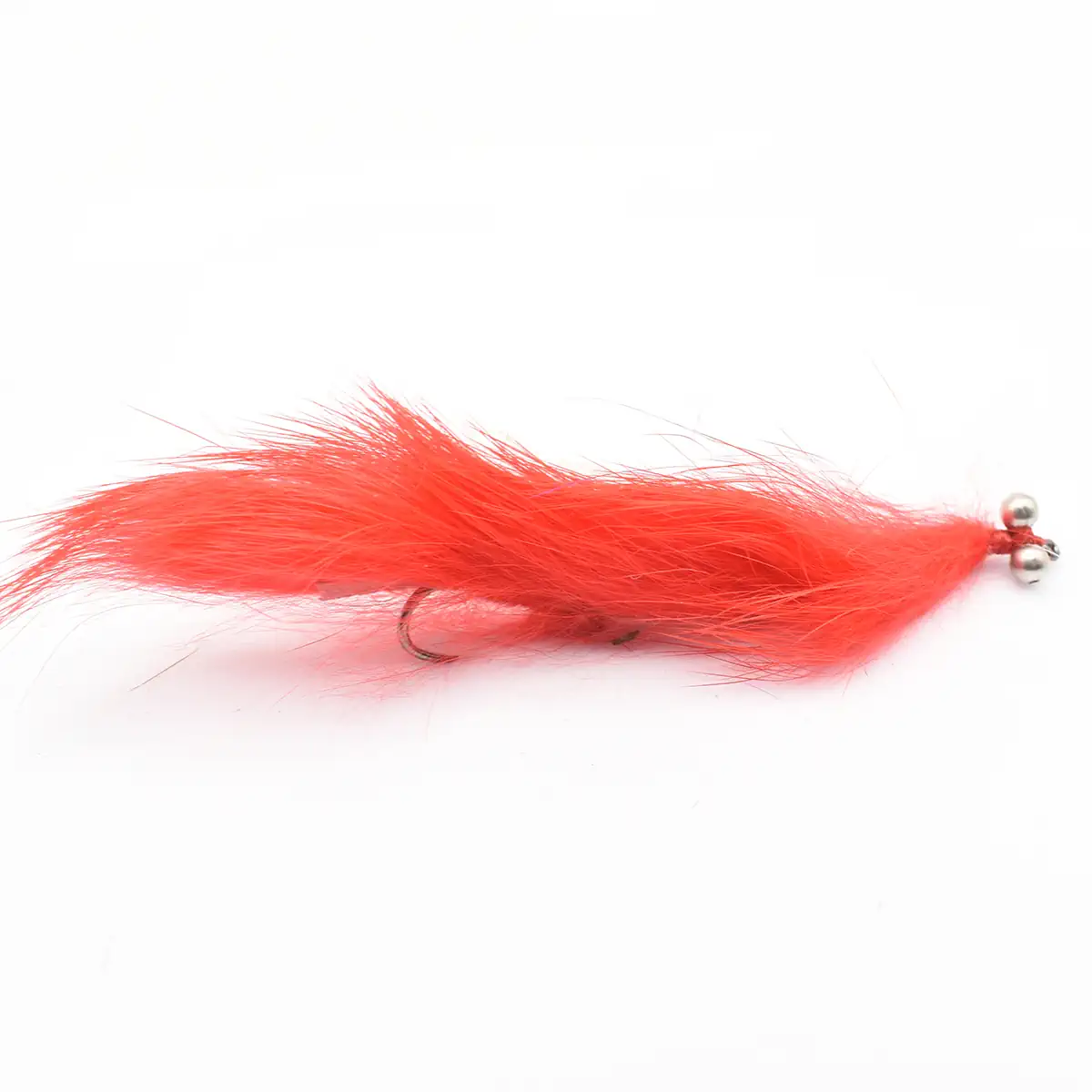 Red fluffy fishing lure with a metal hook and two small silver beads at the tail end.