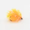 Orange fuzzy marabou-style fishing lure with numerous yellow fibers and a small hook at one end, viewed from above.