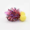 Colorful tinsel pom-pom cat toy with two yellow foam balls attached on a white background.