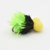 Small fishing lure with neon green and black tinsel fibers and a yellow foam body, likely used to attract bass.