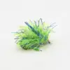 Green and blue metallic tinsel pom-pom craft ball on a light background