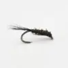 Close-up of a black fishing fly tied on a curved hook with a hairy, segmented body and hackle.