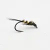 Bead-headed black fishing fly with a fuzzy body and gold bead wrappings, used as an artificial lure in fly fishing