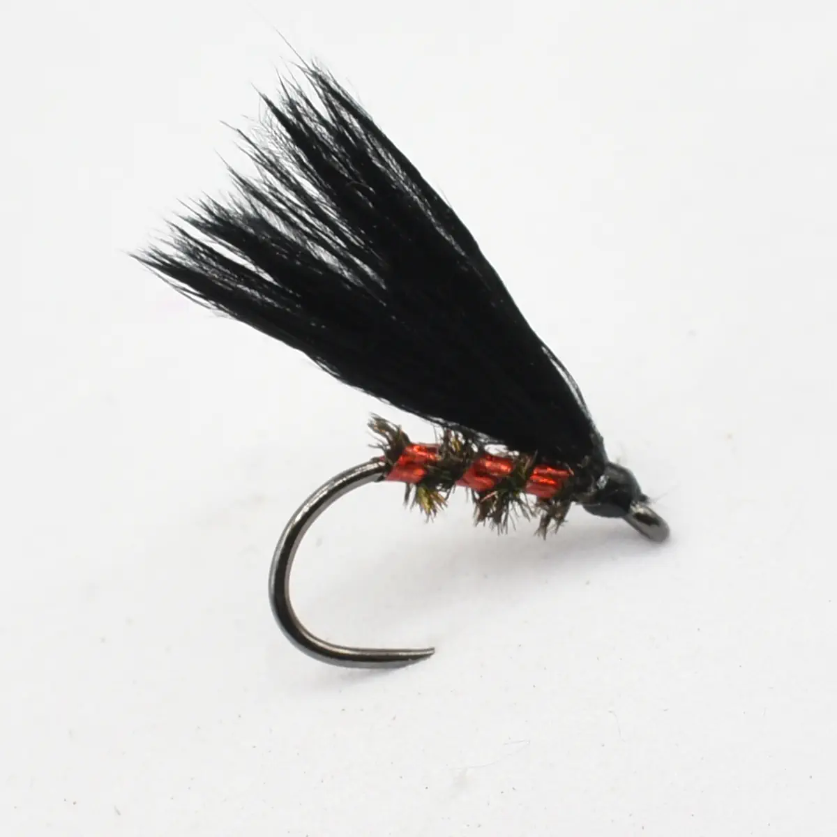 Black feathered fishing fly lure with a red beaded body on a curved hook used for fly fishing