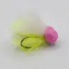 Pink foam-headed fishing lure with bright yellow feather tail and a visible hook, used for fly fishing or trolling.