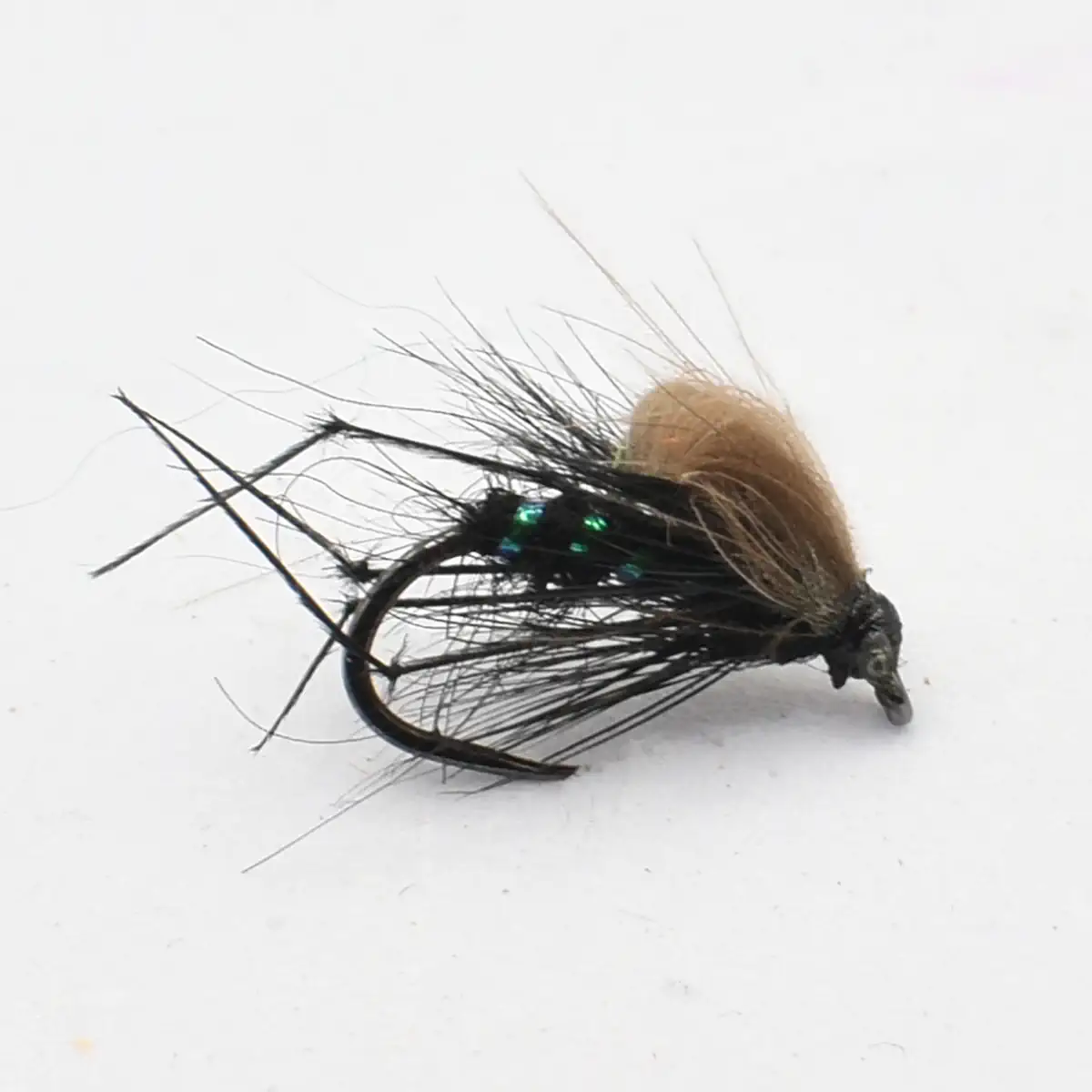 Fly fishing lure with black body, brown hackle, and a small iridescent green bead on a curved hook