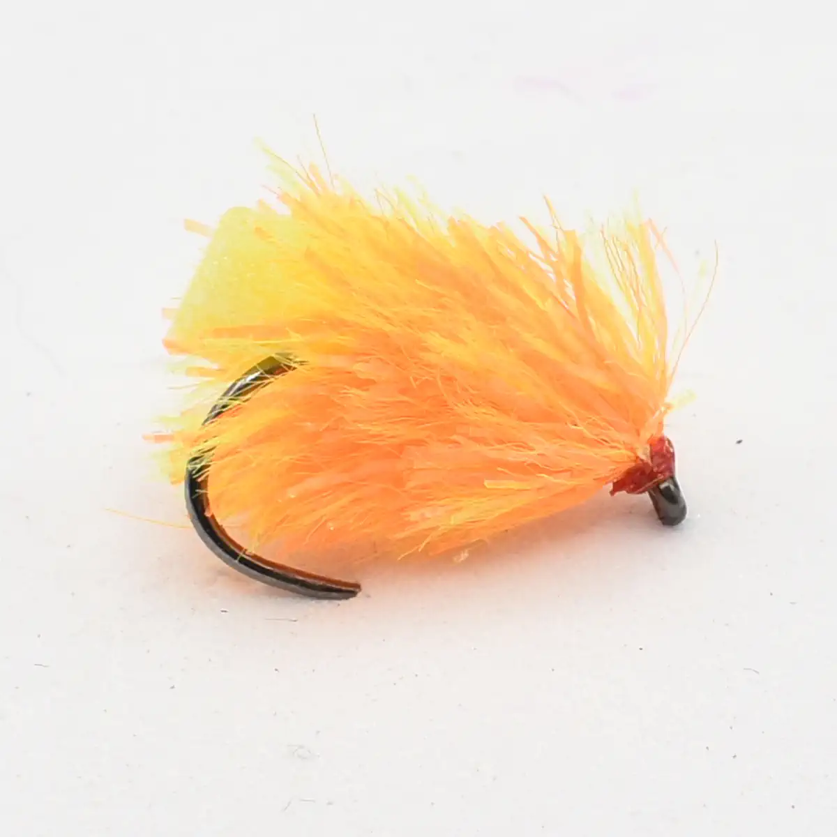 Orange feathered fishing fly lure tied to a dark hook with red thread.