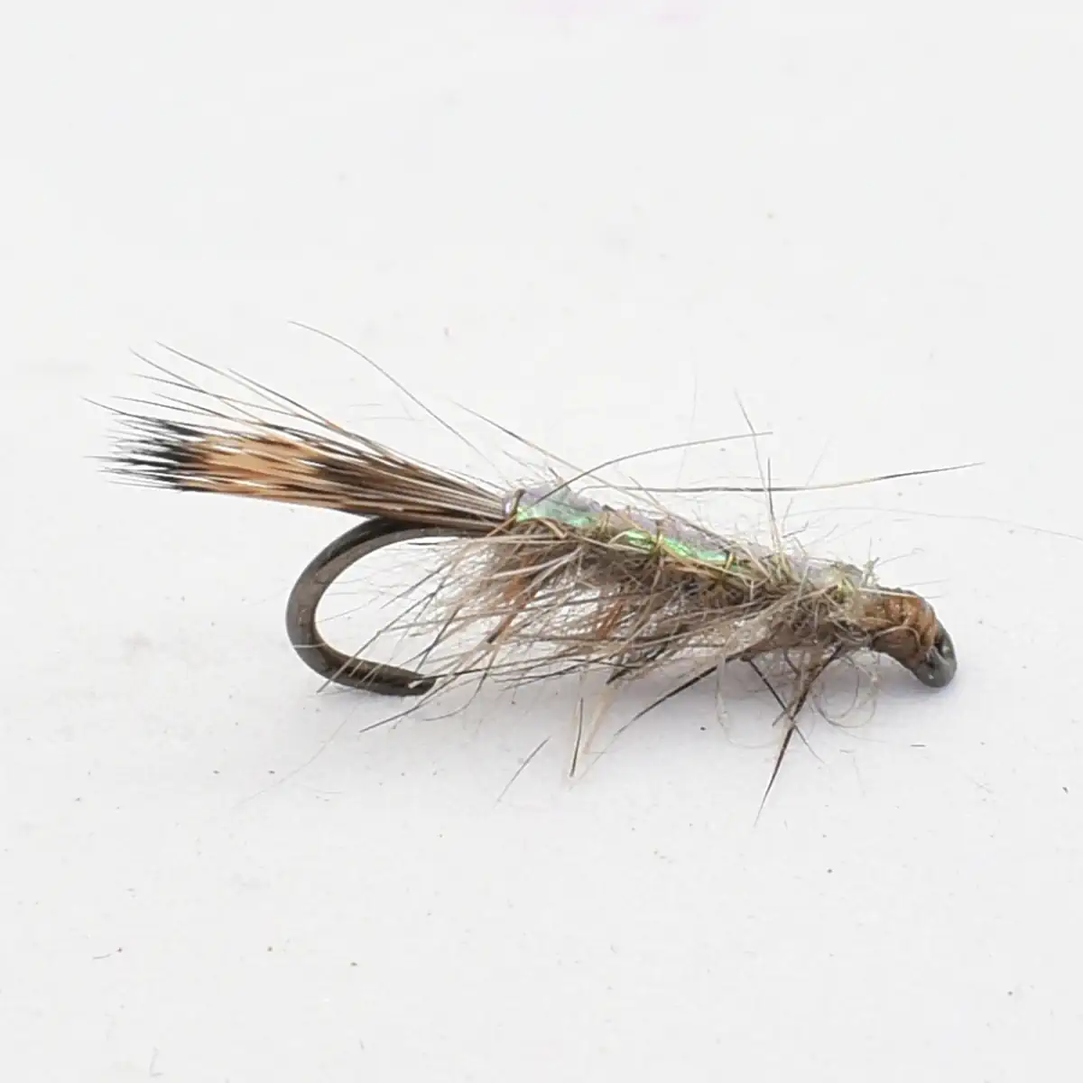 Close-up of a fishing fly (artificial lure) with brown feathers and green thread on a black hook.