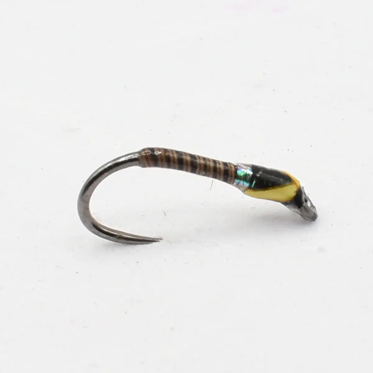 Metal fishing hook with brown wrapped grip and small yellow-and-black lure on a white background, ready to bait a fish