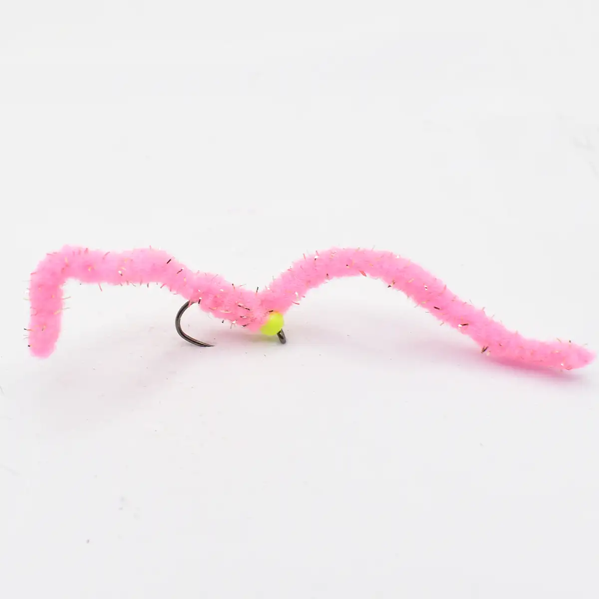 Pink fuzzy chenille worm fishing lure mounted on a curved hook with a small yellow bead