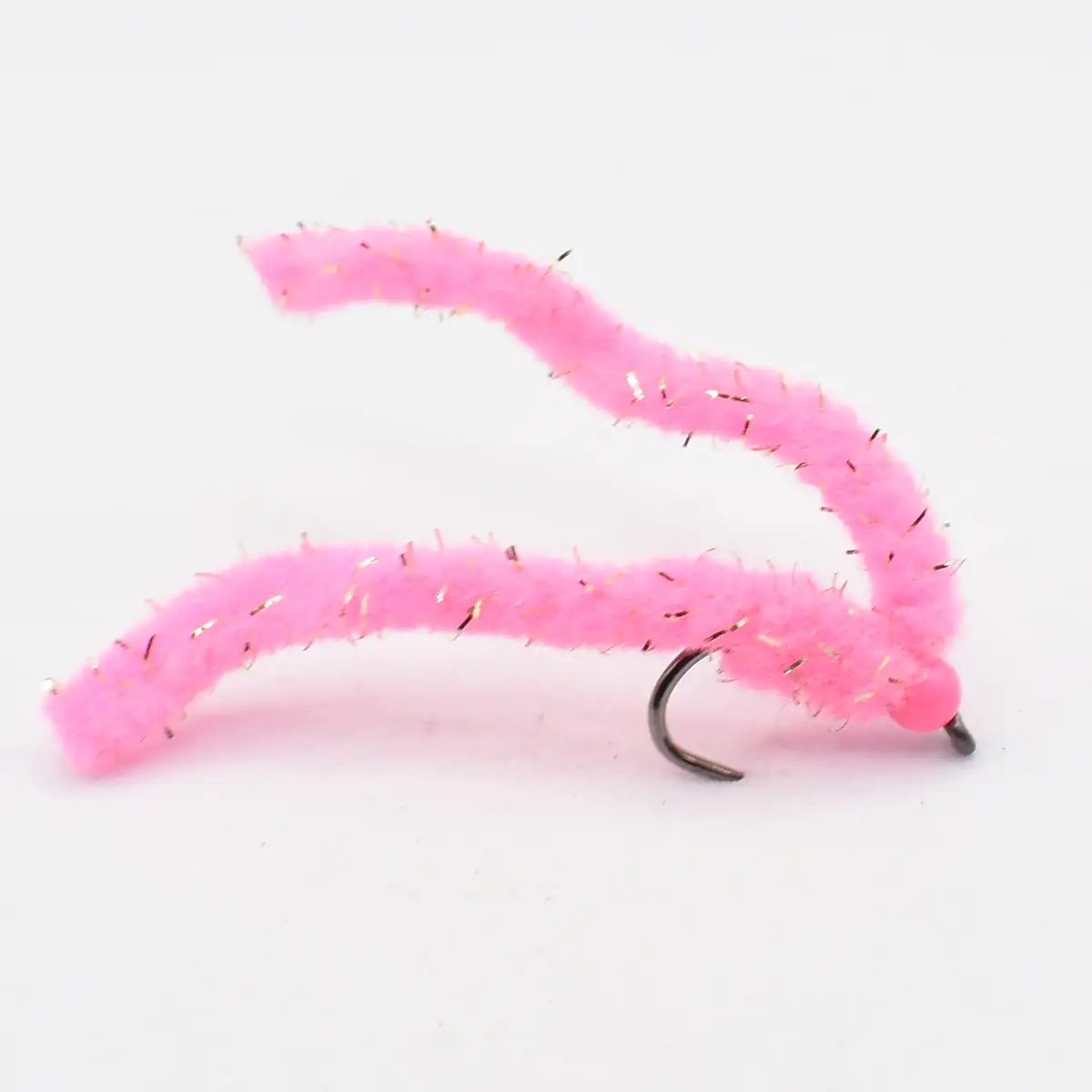 Pink fuzzy fishing lure with a curved hook, designed to attract fish by its bright color and soft chenille body.