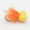 Bright orange feathered fishing lure with two yellow foam beads mounted on a small dark ring.
