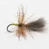 Close-up of a fishing fly with brown and tan hackle feathers tied to a dark hook, olive green body, used for fly fishing.
