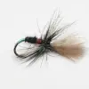 Artificial fishing fly with a black body, red rib, green metallic head, and tan feather tail on a curved hook, used for fly fishing.