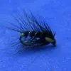 Black fishing fly with long wispy black hackle and a yellow head bead on a blue background.