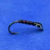 Close-up of a black fishing hook with red thread wraps on a blue background.