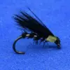 Black feathered fishing fly with a curved hook, used for fly fishing, laid on a blue background.