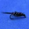 A black artificial fly lure for fly fishing with feathered hackle and a curved hook on a blue background.