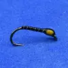 Close-up of a black fishing hook wrapped with white thread and a yellow bead on a blue background, a simple lure.