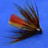 Colorful fishing fly with red and yellow feathers on a small hook against a blue background.