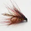 Close-up of a colorful fishing fly with brown and red hackle tied around a small hook, used for fly fishing
