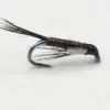 Metallic fishing fly lure with brown ribbed body and black feathered tail, mounted on a curved hook.