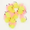 Assorted bright pink and yellow fluffy fishing flies with hooks for fly fishing