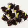 Close-up of black-and-red tinsel fishing lures with yellow foam beads and metal hooks