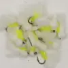 Assorted white feather fishing flies with neon yellow accents and small foam beads, hooks visible among the feathers.