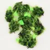 Assortment of bright green and black fuzzy fishing flies with metal hooks.
