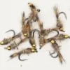 Assorted hand-tied fishing flies with bead heads on a white background for fly fishing.