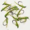 Assortment of green feathered fishing flies with hooks on a white background, ready for fly fishing.