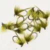 Several olive-green fishing flies with feathered hair attached to hooks on a white background, arranged loosely.