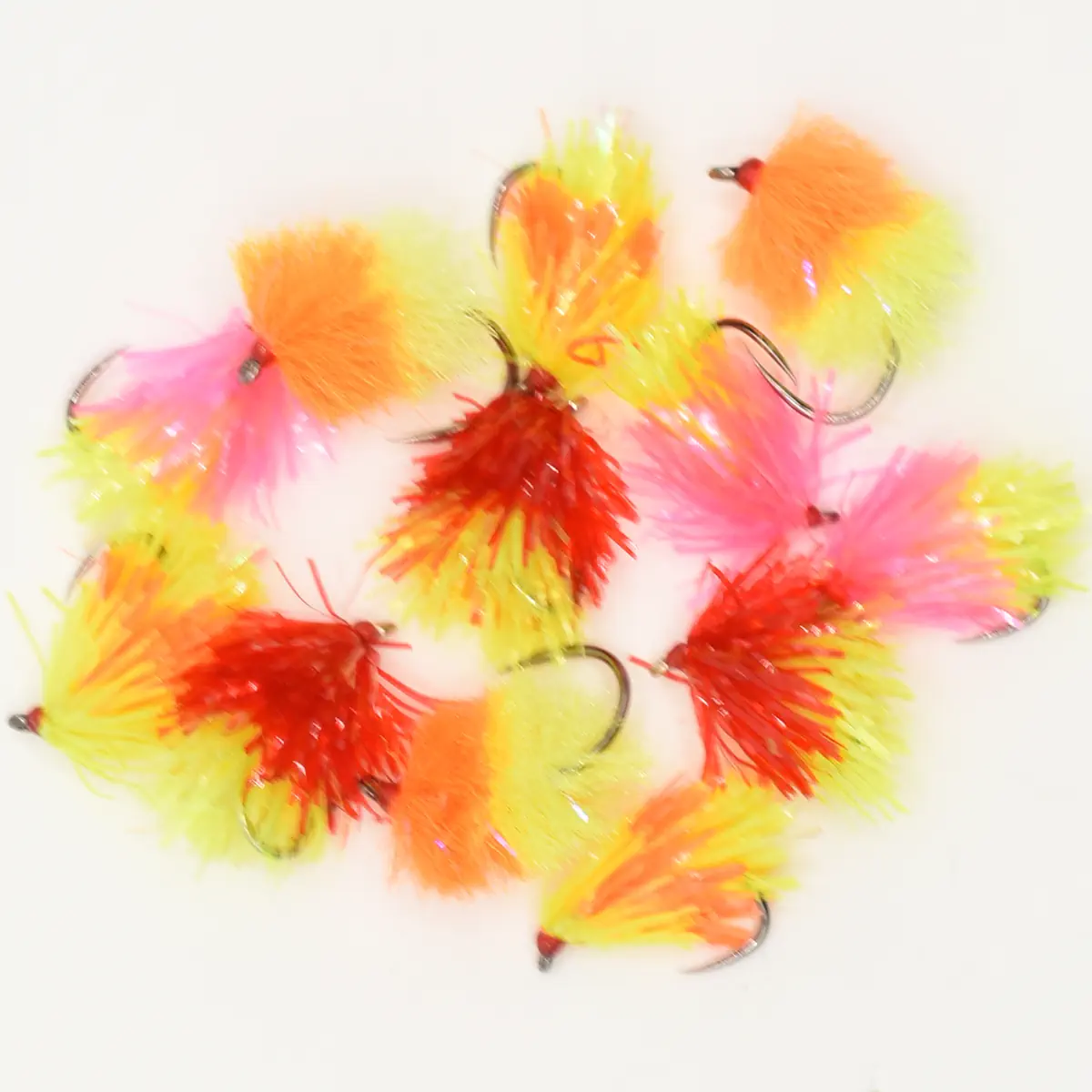 Assorted colorful fishing flies with feather skirts on hooks.