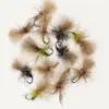 Assortment of fluffy, fur-topped fishing flies tied to hooks on a white background.