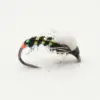 Close-up of a colorful fishing fly with iridescent green stripes and orange head for fly fishing showpiece.