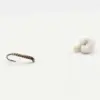Small fishing lure with a curved hook, striped brown body, and a thin line leading to a white foam float on a white background.